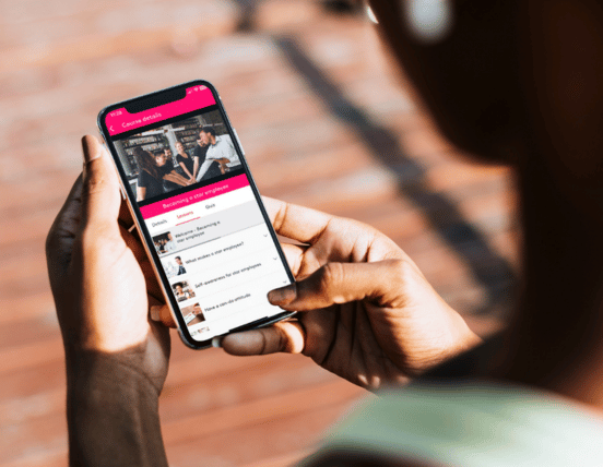 Hospitality professional accessing mobile learning platform on smartphone